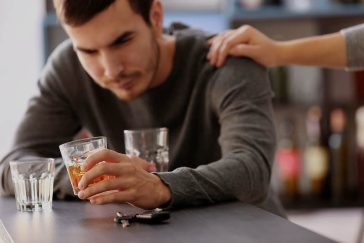 A man with alcohol addiction losing his parent-child relationship due to drinking problems